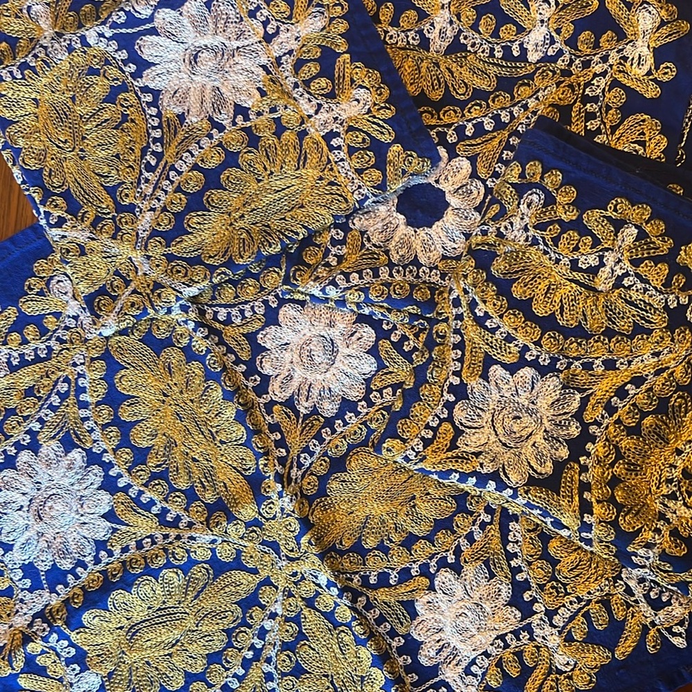 Napkins:  set of 4. Rich blue, gold and white embroidered napkins